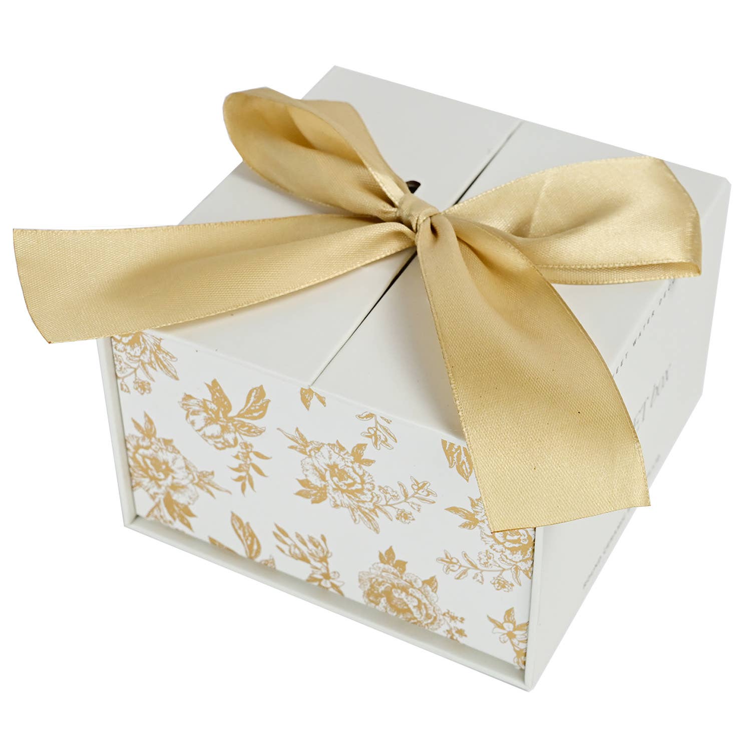 White gift box with gold floral patterns and a gold ribbon on a white background