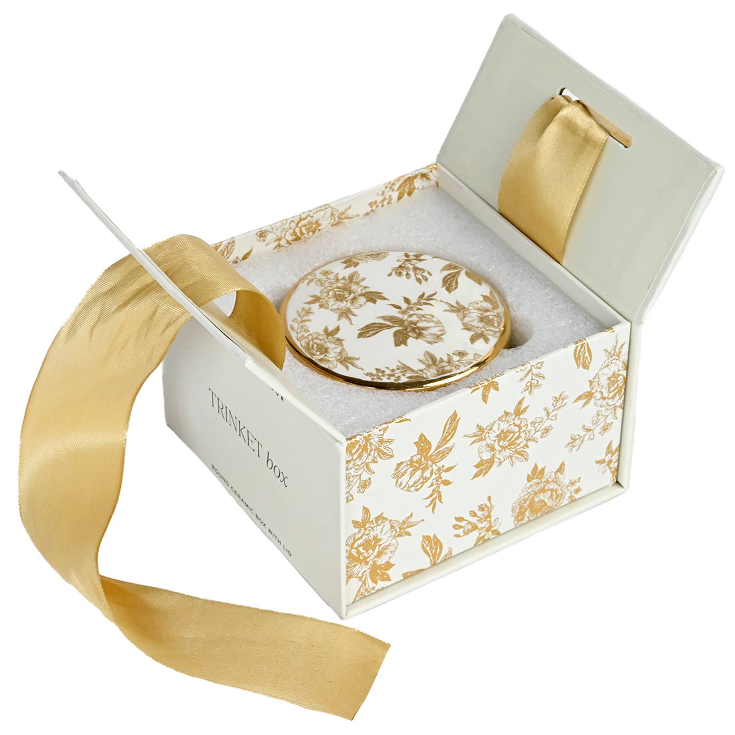 Decorative plate with gold floral design in a matching box with a gold ribbon on a white background